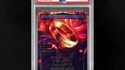 Magic: The Gathering's 1/1 The One Ring in a PSA grading box